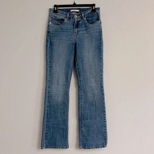 Levi Strauss & Co. jeans. Size 4. Classic Boot. 
Waist=28”.